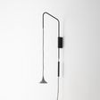 Conical Adjustable Wall Lamp | Artemide Unterlinden | Italianfurniture.com